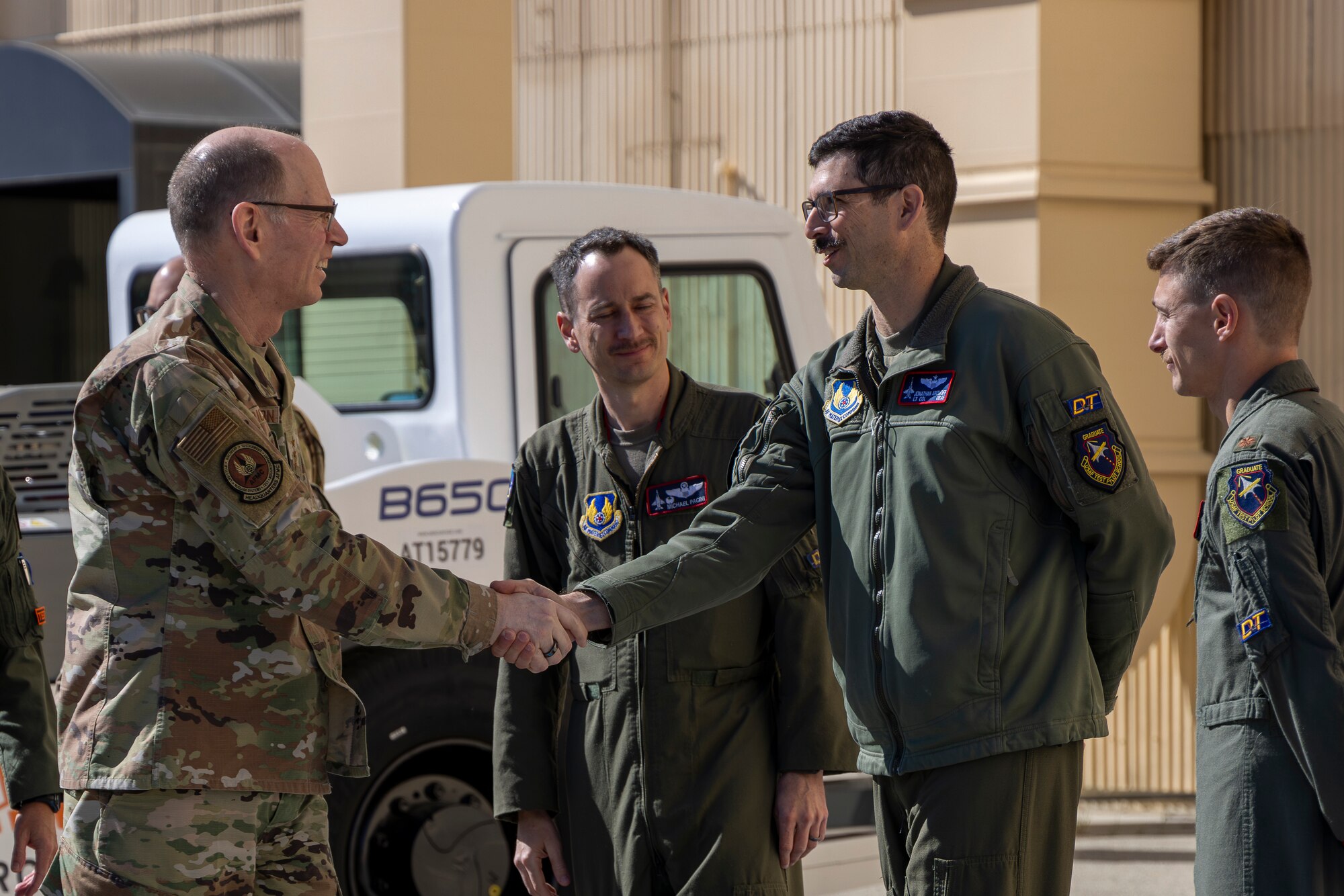 Gen. Duke Z. Richardson, commander, Air Force Materiel Command, meets Lt. Col. Jonathan Aronoff, director T-7 Integrated Test Force, 416th Flight Test Squadron, during a visit to Edwards Air Force Base, California, March 26. (Air Force photo by Lindsey Iniguez)