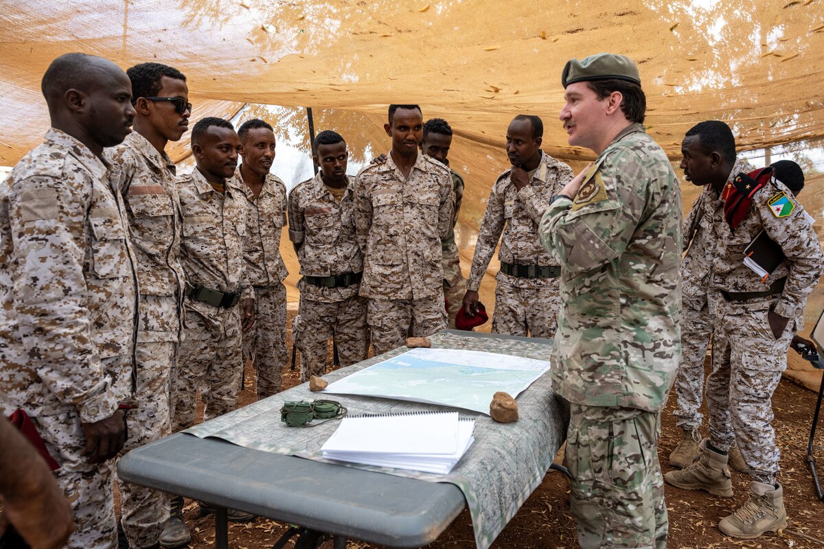 A U.S. Air Force member instructs Djiboutian soldiers.