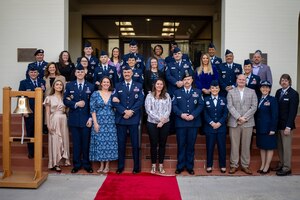 Air Force Recruiting Service’s 13 best recruiters and spouses representing the Total Force recruiting mission pose for a group photo March 19, 2024, at Joint Base San Antonio-Randolph, Texas