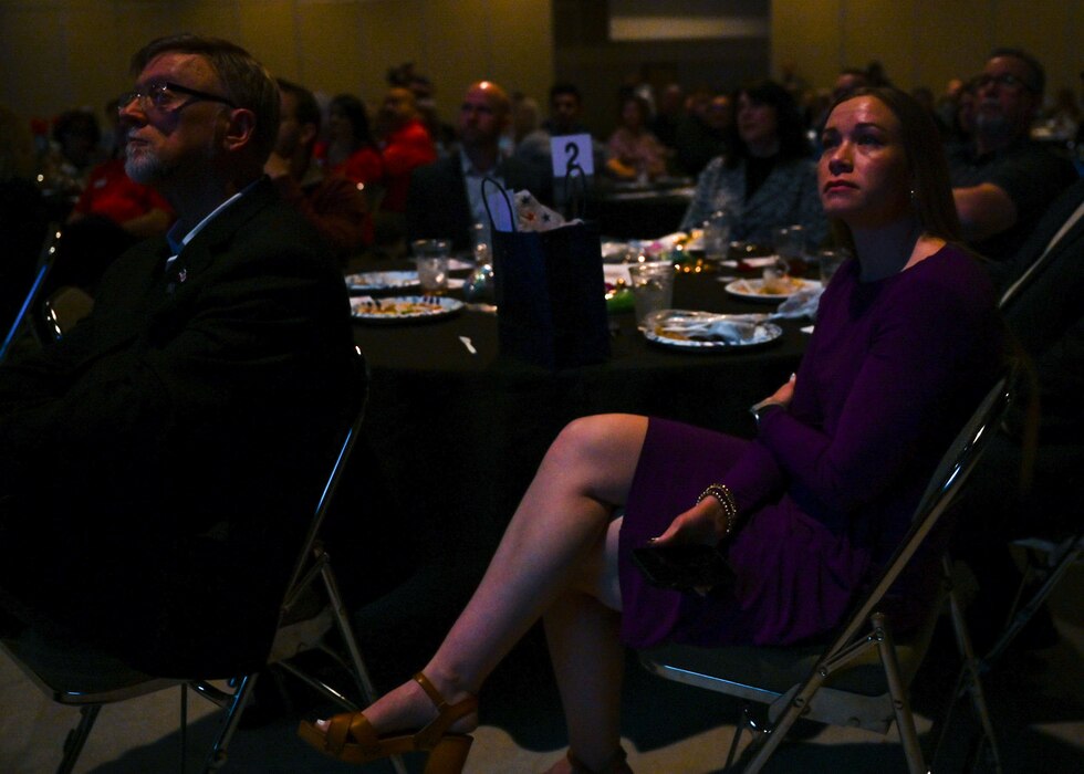 San Angelo Chamber of Commerce members watch the State of Goodfellow video during the San Angelo Chamber of Commerce State of Goodfellow luncheon at the McNease Convention Center, San Angelo, Texas, Mar. 19, 2024. The luncheon allowed attendees to hear updates from various San Angelo community members and 17th Training Wing representatives. (U.S. Air Force photo by Airman 1st Class Evelyn J. D’Errico)