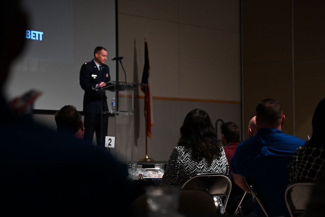 U.S. Air Force Col. Christopher Corbett, 17th Training Wing deputy commander, speaks at the San Angelo Chamber of Commerce State of Goodfellow luncheon at the McNease Convention Center, San Angelo, Texas, Mar. 19, 2024. Corbett’s participation presented an opportunity to inform civic leaders about the state of Goodfellow and highlight the good relationship with the San Angelo community. (U.S. Air Force photo by Airman 1st Class Evelyn J. D’Errico)