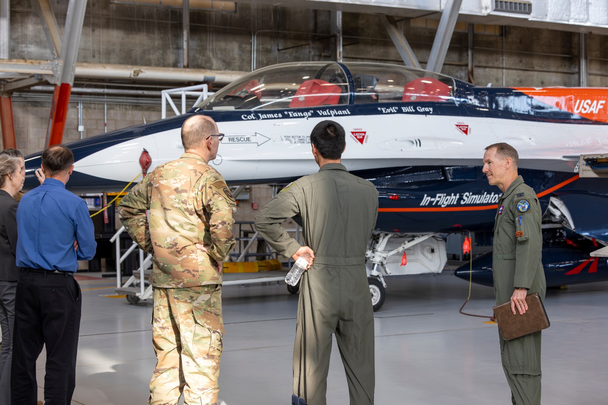 Gen. Duke Z. Richardson, commander, Air Force Materiel Command, receives a plane-side brief about the X-62 VISTA (Variable In-flight Simulation Test Aircraft) during a visit to Edwards Air Force Base California, March 26. Richardson learned about the key role the VISTA has played in the advancement of autonomous aircraft systems. (Air Force photo by Lindsey Iniguez)