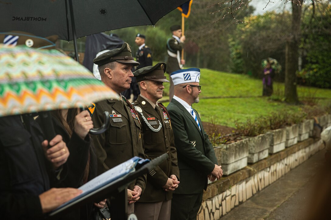 Maj. Gen. Christopher R. Norrie, Command Sgt. Maj. Jonathan Reffeor of the 3rd Infantry Division, and Mr. Toby Knight, president of the Society of the Third Infantry Division, take part in the inauguration memorial dedicated to the 3rd Infantry Division, in Mignano Montelungo, Italy, March 26, 2024. The 3rd ID Soldiers from the 7th, 15th, and 30th regiments fought in 1943 at the Mignano Gap in the attempt to open the way to Rome to liberate the city from Nazi Fascism.  The memorial commemorates the Divisions’ point of maximum advance during the battle and honors those who made the ultimate sacrifices to eradicate tyranny. The 3rd Infantry Division’s mission in Europe is to engage in multinational training and exercises across the continent, working alongside NATO Allies and regional security partners to provide combat-credible forces to V Corps, America’s forward-deployed corps in Europe. (U.S. Army photo by Sgt. Michael Udejiofor)