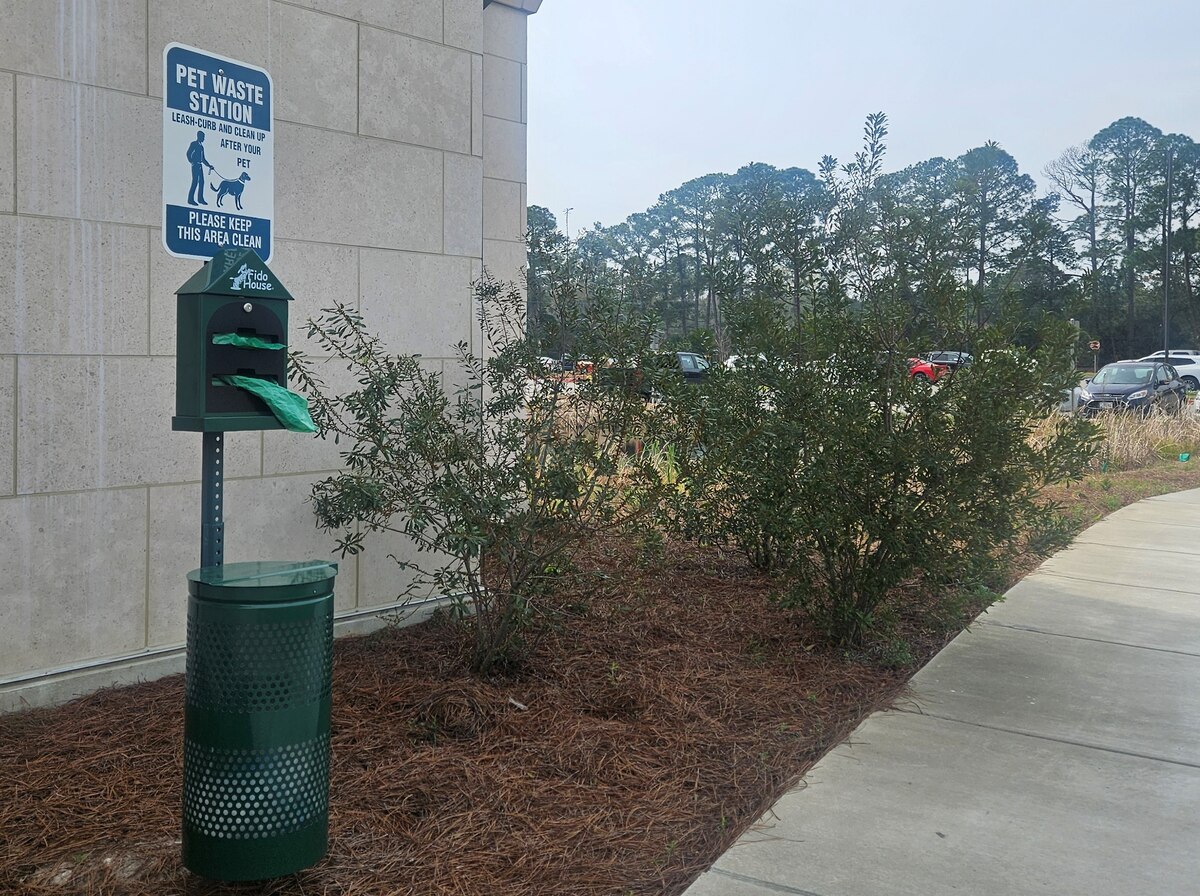 Pet waste station near lodging building