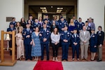 Air Force Recruiting Service’s 13 best recruiters and spouses representing the Total Force recruiting mission pose for a group photo March 19, 2024, at Joint Base San Antonio-Randolph, Texas