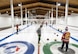 Members of the Minot AFB Curling League compete in their championship match at the Minot Curling Club, Minot, North Dakota, March 19, 2024. The Minot AFB Curling League’s season began in January and concluded in March, lasting a total of 10 weeks. (U.S. Air Force photo by Airman 1st Class Kyle Wilson)