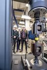 Bennett Yeo, Alex Mosser, Joseph Hughes and Warren Herrington participate in a familiarization tour, Feb. 15, 2024, during a new orientation program for new Naval Reactors engineers visiting Puget Sound Naval Shipyard & Intermediate Maintenance Facility in Bremerton, Washington. (U.S. Navy photo by Jeb Fach)