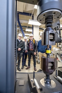 Bennett Yeo, Alex Mosser, Joseph Hughes and Warren Herrington participate in a familiarization tour, Feb. 15, 2024, during a new orientation program for new Naval Reactors engineers visiting Puget Sound Naval Shipyard & Intermediate Maintenance Facility in Bremerton, Washington. (U.S. Navy photo by Jeb Fach)