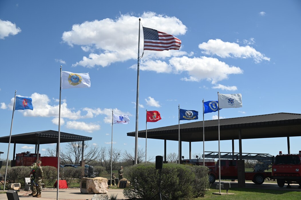 U.S. armed forces flags shown at the Fire Protection Heritage Pathway, at Goodfellow Air Force Base Texas, March 22, 2024. The Fire Protection Heritage Pathway is a memorial that symbolizes the heroism and sacrifice of Department of Defense firefighters who gave their lives in the line of duty (U.S. Air Force photo by Airman James Salellas)