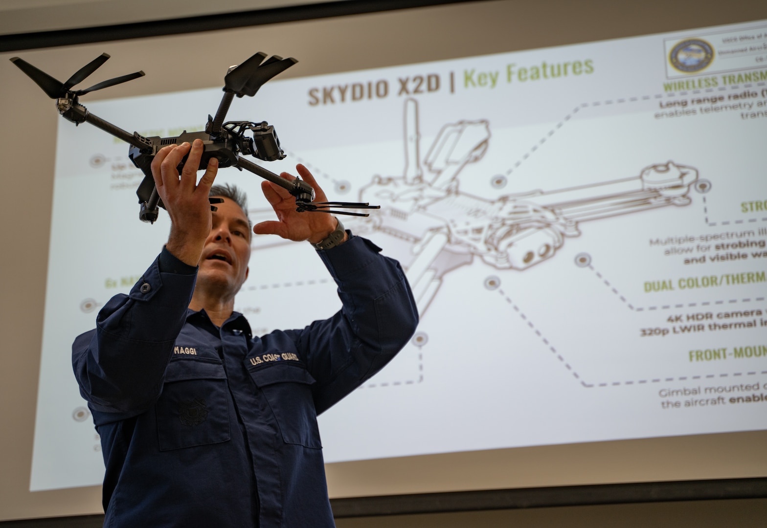 Capt. Brian Maggi, Head of Civil Engineering at the Coast Guard Academy, holds up a drone during a training course at the Coast Guard Academy, New London, Conn, Feb 21, 2023. The Coast Guard Short Ranged Unmanned Aerial Systems (SR-UAS) program is designed to create designated pilots and integrate drone capabilities into various missions. (U.S. Coast Guard photograph by Petty Officer 3rd Class Matt Thieme)