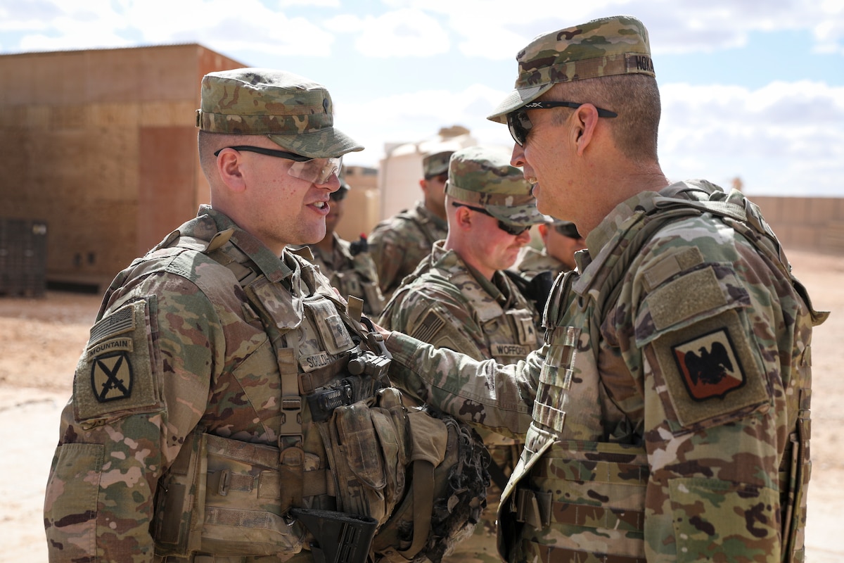 Army Gen. Daniel Hokanson, right, chief, National Guard Bureau, and SEA Tony Whitehead, senior enlisted advisor to the CNGB, visit National Guardsmen deployed in the U.S. Central Command area of responsibility March 15, 2024.