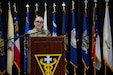 Col. Renn D. Polk, incoming commander, 3rd Medical Command (Forward), addresses those in the audience for the unit's Change of Command and Responsibility Ceremony at Camp Arifjan, Kuwait, March 21, 2024. Polk's speech emphasized that the incoming command team is eager to continue the unit's support and services to the region while looking for ways to improve them.