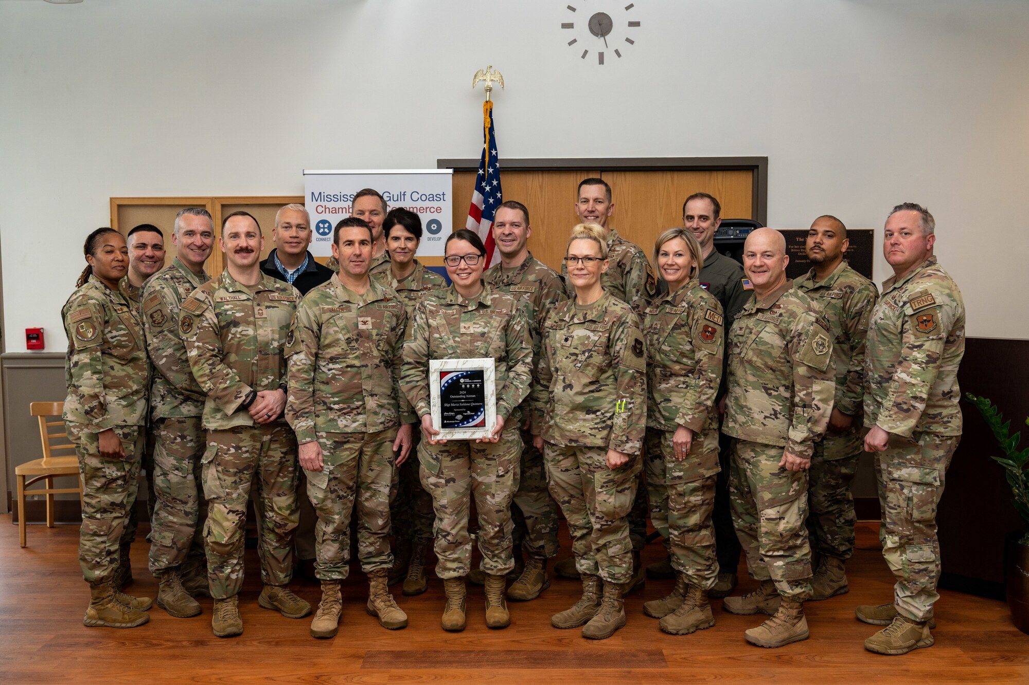 Leadership with Keesler Air Force Base pose for a group photo during the Biloxi Chamber of Commerce Breakfast with the Mayor at Merit Health Biloxi, Mississippi, March 26, 2024. The Biloxi Chamber of Commerce hosted the breakfast as an update for the community and to present Community Excellence Awards. (U.S. Air Force photo by Andrew Young)