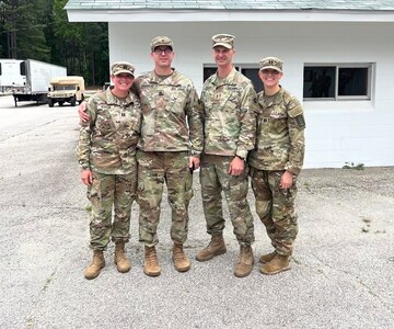 Capt. Catherine Bean, on the far right, poses with friends and peers. (Courtesy photo)