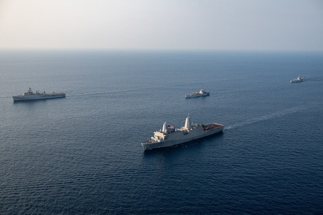 USS Somerset (LPD 25) leads a formation of US and Indian navy ships in the Bay of Bengal.