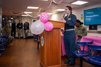 Lt. Olivia Rhodes delivers remarks during a Women's History Month observance aboard USS Blue Ridge (LCC 19) at Fleet Activities Yokosuka.