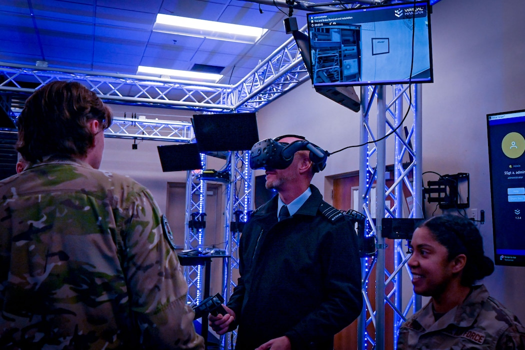 A uniformed personnel wears a virtual reality headset
