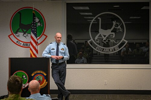 A Royal New Zealand Air Force member speaks with leadership