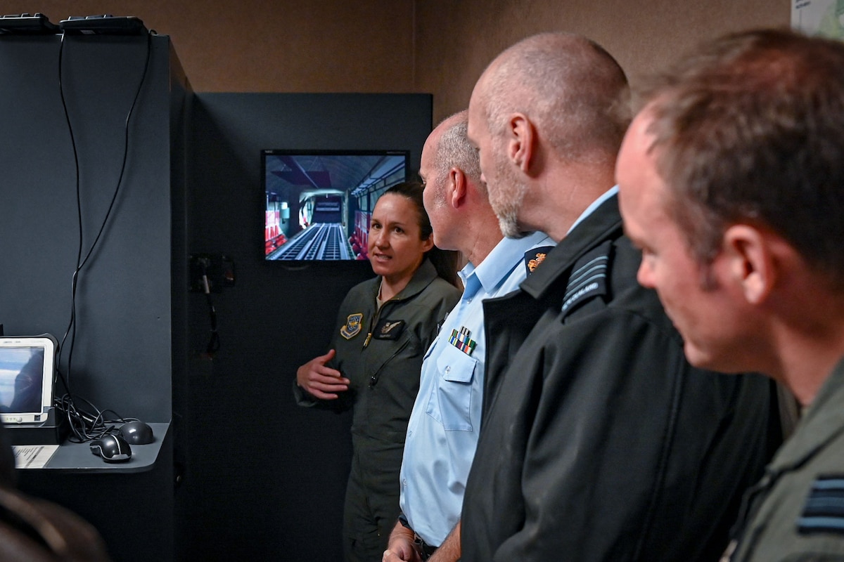 A Royal New Zealand Air Force speaks with leadership