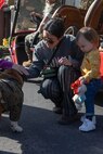 U.S. Marine Corps Pfc. Bruno, the Marine Corps Recruit Depot San Diego and Western Recruiting Region mascot, greets guests during a MCRD San Diego Spring Storytime event at MCRD San Diego, March 27, 2024. The mascot’s job is to boost morale, participate in outreach work, and attend events and ceremonies. (U.S. Marine Corps photo illustration by Lance Cpl. Janell B. Alvarez)