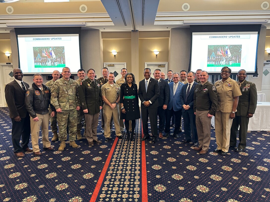 Participants of the Virginia Military Advisory Council take a group photo at the Clubs at Quantico, Virginia, March 14, 2024. The VMAC holds quarterly meetings to explore issues impacting the quality of life for service members, their families, relations between the installations and surrounding civilian communities, and the effects on Virginia's growing infrastructure. (U.S. Marine Corps Photo by Michael Lujan)
