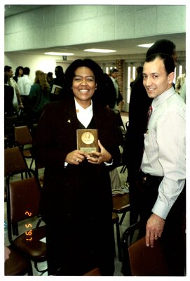 A photo fo Tracy Arnold-Berrios (left) poses for a photo with her husband, Juan Berrios (right) after receiving the Joe L. Browning Award for Managerial Excellence, 1997. Now the Director of Integrated Nuclear Weapons Safety & Security at the U.S. Navy’s Strategic Systems Programs (SSP) and a member of the DOD’s Senior Executive Service, Arnold-Berrios has more than 40 years of experience in the Science, Technology, Engineering and Math field. SSP’s mission is to provide credible and affordable strategic solutions that equip America’s Warfighting Navy to deter strategic attack and underwrite the security of our nation and our allies. (Photo Courtesy: Tracy Arnold-Berrios/Released)