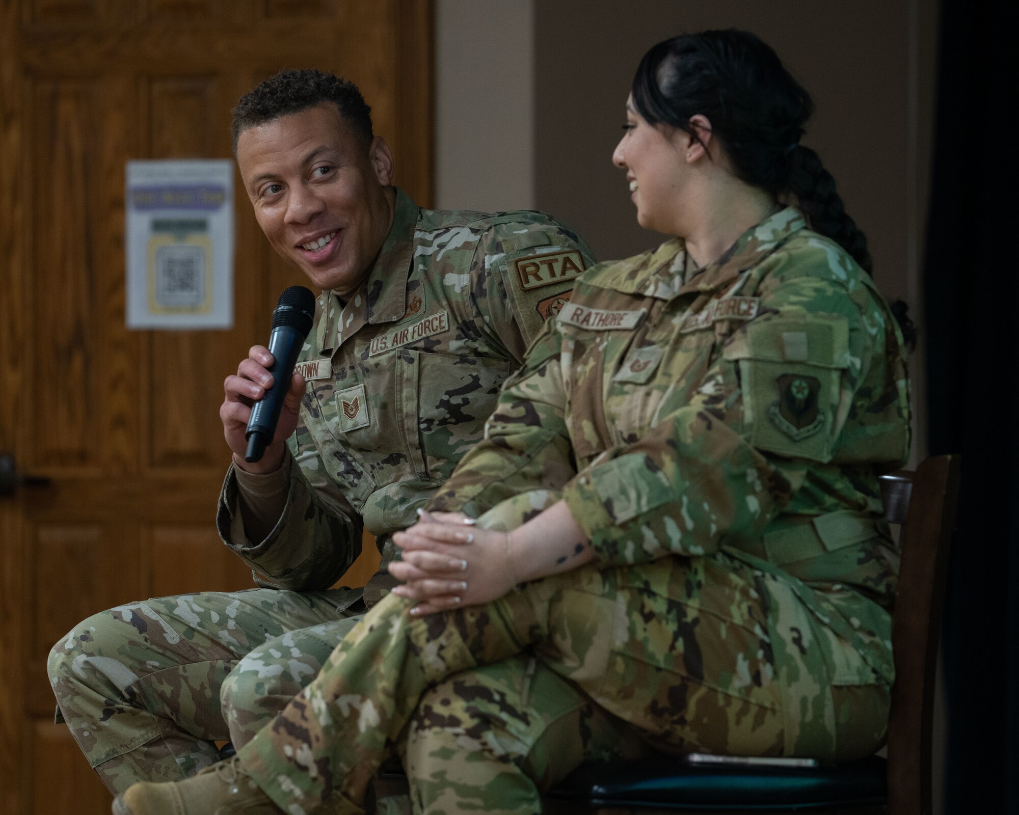 U.S. Air Force Tech. Sgt. Justin Brown, 20th Special Operations Squadron squadron aviation resource management member, and Tech. Sgt. Shivali Rathore, 33rd Special Operations Squadron flight chief, discuss ways Airmen can become mentors at the 2nd Annual Women’s Leadership Symposium, Cannon Air Force Base, N.M., on March 15, 2024. The Women’s Leadership Symposium’s mission is to send a message of professional development, inclusivity and commitment aiming to inspire and empower everyone at Cannon AFB. (U.S. Air Force Photo by Senior Airman Mateo Parra)