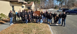 Members of the 319th Recruiting Squadron along with members of the Committed Augmentee Recruiting Effort Team at Hanscom Air Force Base, Mass pose for a photo after conducting lead refinement center tasks.