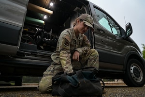 U.S. Air Force Senior Airman Collby Moran, a 1st Special Operations Civil Engineer Squadron water and fuel systems maintenance journeyman, reaches into her tool kit at Hurlburt Field, Florida, March 26, 2024.