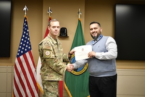 Maldonado receives an award for superior performance from Air Combat Command.