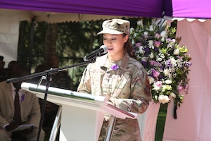 Woman speaks from podium.