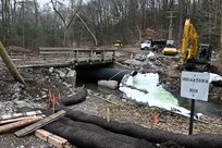 Work recently began to replace the bridge over Indiantown Run that connects Lake Road at Marquette Lake with Asher Miner Road (Route 443) at Fort Indiantown Gap. When completed, the new two-lane bridge will serve as both the entrance and exit for the lake and the Keystone Conference Center, and the road over the Marquette Lake dam that is currently used as the entrance to the lake and the KCC will be closed to vehicular traffic. (Pennsylvania National Guard photo by Brad Rhen)