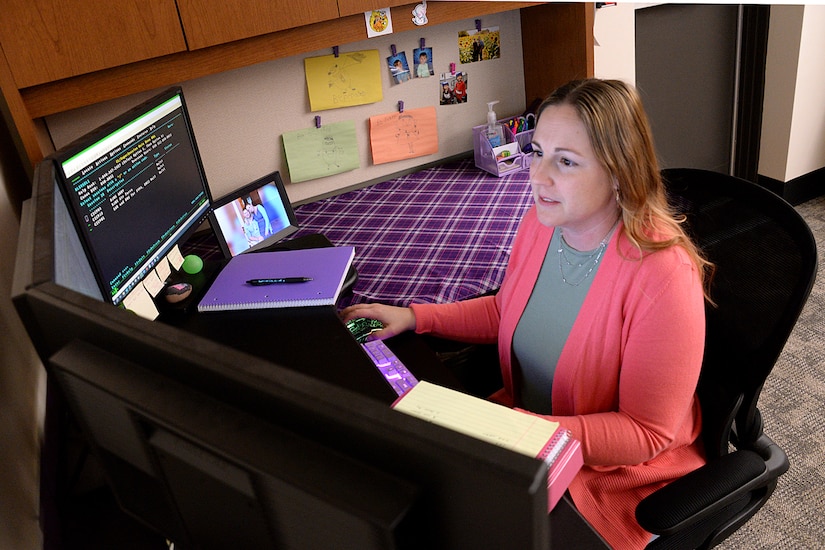 Erin Wiegers, Army Military Pay Office military pay technician, works on tasks related to release orders and an entry of judgement awarding a prisoner’s family six months of pay in the Fort Leavenworth, Kansas AMPO March 22, 2024. A recent U.S. Army Financial Management Command initiative ensures AMPO employees who relocate with their service member spouses during permanent changes of station will maintain their positions within the command. (U.S. Army photo by Prudence Siebert)