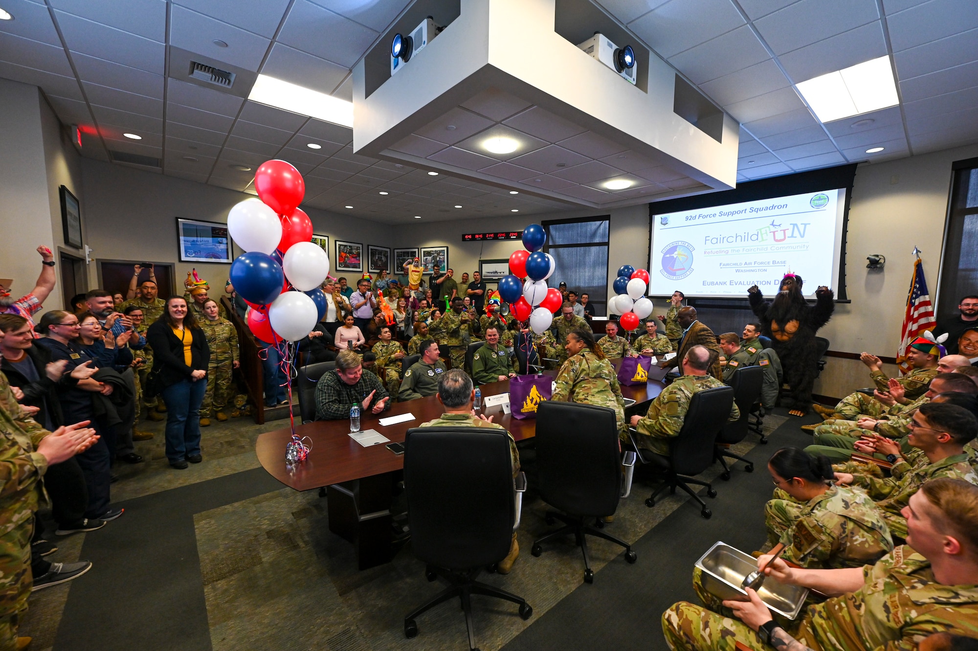 People celebrating in a conference room