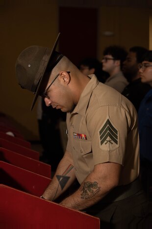U.S. Marine Corps Sgt. David Plummer, a drill instructor with Receiving Company, Support Battalion, inspects for contraband during the receiving process for the recruits with Bravo Company, 1st Recruit Training Battalion, at Marine Corps Recruit Depot San Diego, March 25, 2024. During the receiving process recruits are checked for contraband, given haircuts, make phone calls home, and are issued gear. (U.S. Marine Corps photo by Lance Cpl. Janell B. Alvarez)