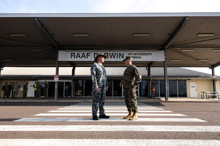 U.S. Marine Corps Col. Brian Mulvihill, right, the commanding officer of Marine Rotational Force – Darwin 24.3, meets Royal Australian Navy Capt. Mitchell Livingstone, the commanding officer of Headquarters Northern Command at Royal Australian Air Force Base Darwin, NT, Australia, March 24, 2024. MRF-D 24.3 is part of an annual six-month rotational deployment to enhance interoperability with the Australian Defence Force and Allies and partners and provide a forward-postured crisis response force in the Indo-Pacific. Mulvihill is a native of New York. (U.S. Marine Corps photo by Sgt. Cristian L. Bestul)