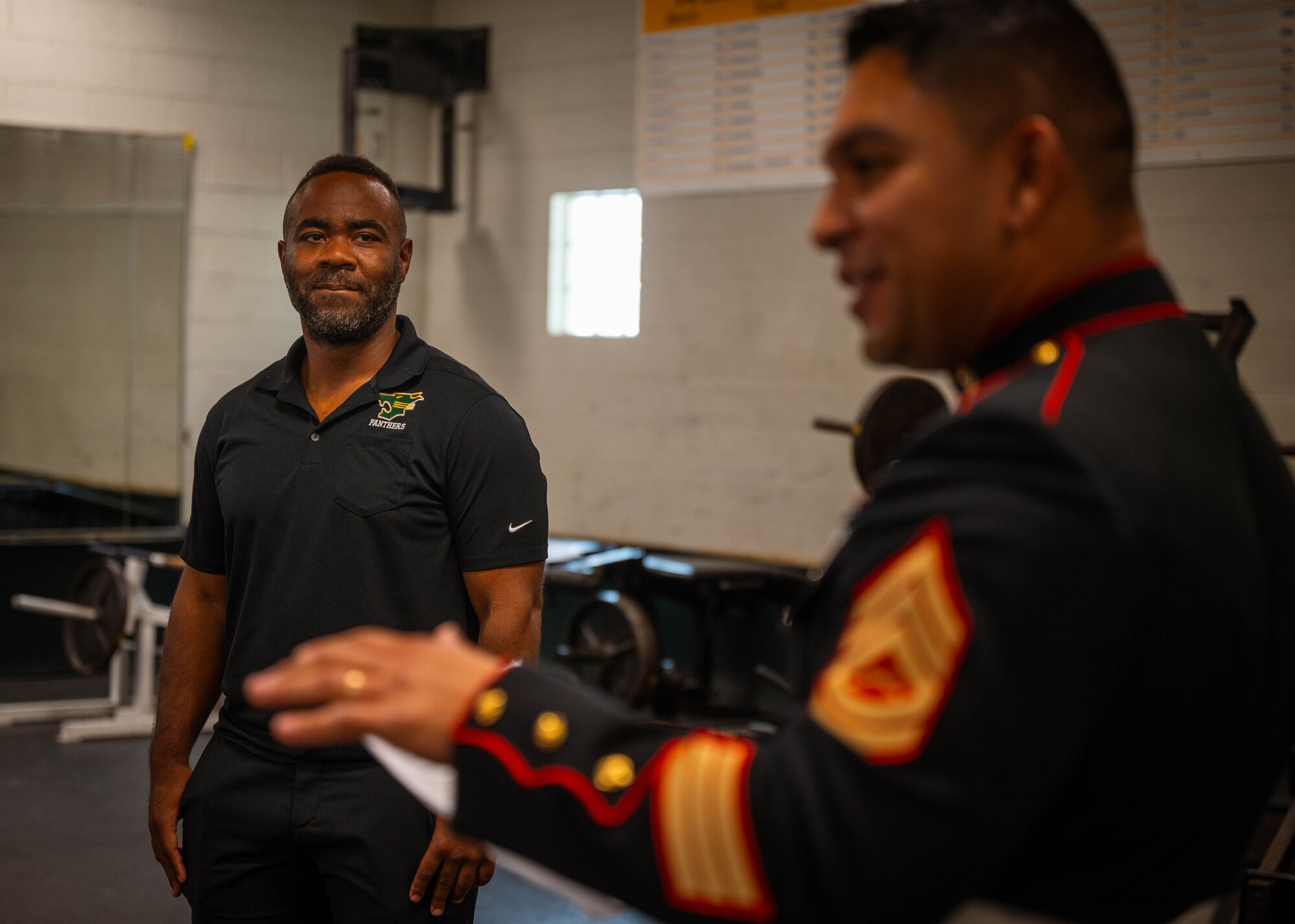 Tech Sgt. Ned McCaster III is awarded the Semper Fidelis Coach Award