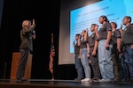 Army Gen. Laura J. Richardson, commander, U.S. Southern Command, administers the oath of enlistment to sixteen new Army recruits during a visit to Northglenn High School, Northglenn, Colo., April 27, 2023.
