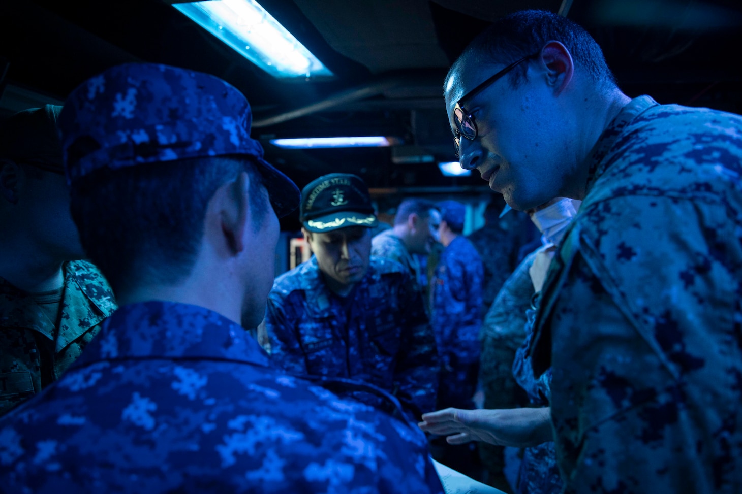 240328-N-SF508-1482 YOKOSUKA, Japan (March 28, 2024) Ensign Simmon McGahey, assigned to the Arleigh Burke-class guided-missile destroyer USS McCampbell (DDG 85), explains tomahawk land attack missile (TLAM) procedures to members of the Japan Maritime Self-Defense Force during TLAM training aboard McCampbell at Commander, Fleet Activities Yokosuka, March 28. U.S. 7th Fleet is the U.S. Navy's largest forward-deployed numbered fleet, and routinely interacts and operates with allies and partners in preserving a free and open Indo-Pacific region. (U.S. Navy Photo by Mass Communication Specialist 1st Class Charles Oki)