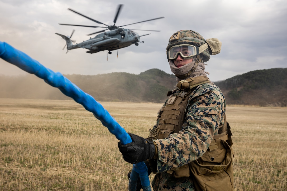 A U.S. Marine with 3rd Landing Support Battalion, 3rd Marine Logistics Group prepares a Joint Light Tactical Vehicle for an external lift during Warrior Shield 24.