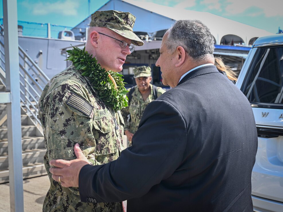 HONOLULU (Mar. 28, 2024) – Secretary of the Navy Carlos Del Toro speaks with Vice Adm. John Wade before the transfer of authority for the closure of the Red Hill Bulk Fuel Storage Facility, March 28. Secretary Del Toro visited Hawaii to speak at the Joint Task Force-Red Hill—Navy Closure Task Force-Red Hill transfer of authority ceremony, meet with Sailors, and visit the local community. (U.S. Navy photo by Mass Communication Specialist 2nd Class Jared Mancuso)