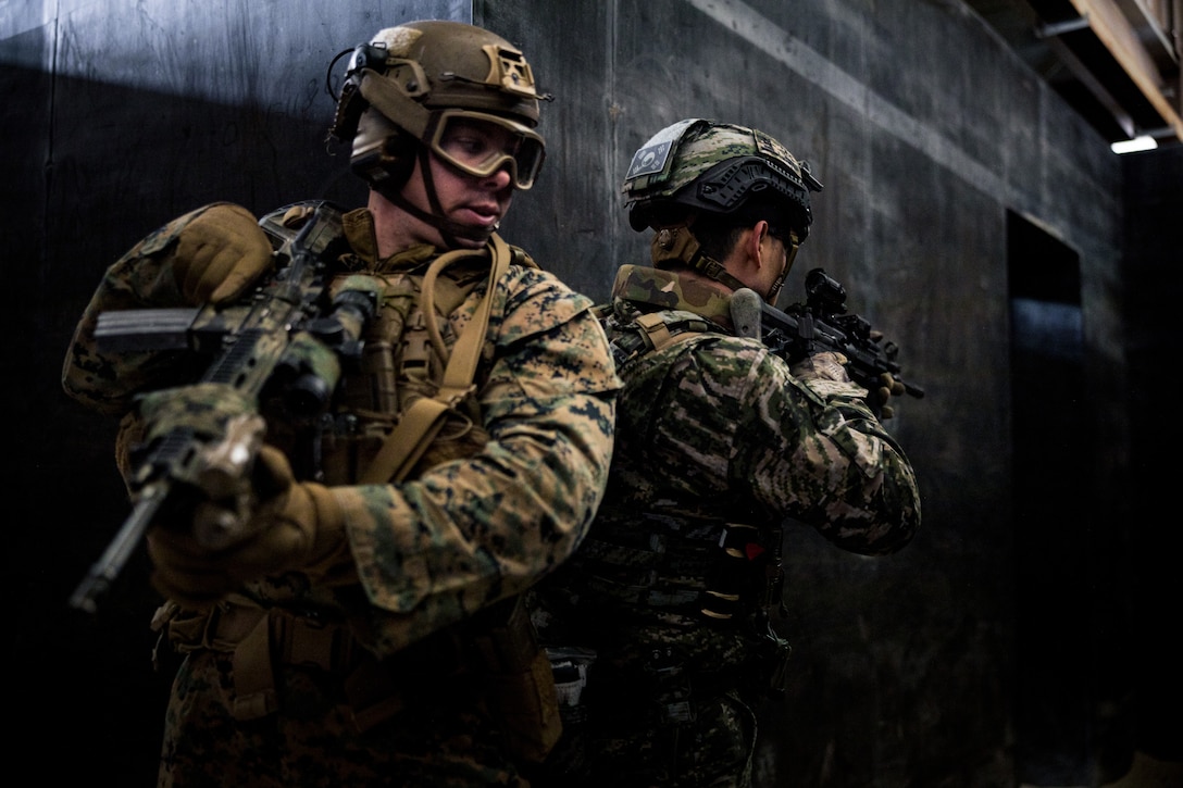 U.S. Marine Corps Sgt. Robert McNulty executes close-quarters combat tactics with Republic of Korea Marines during Warrior Shield 24 at Rodriguez Live Fire Complex, Pocheon, South Korea, March 7, 2024. Warrior Shield 24 is an annual joint, combined exercise held on the Korean Peninsula that seeks to strengthen the combined defensive capabilities of ROK and U.S. forces. This routine, regularly scheduled, field training exercise provides the ROK and U.S. Marines the opportunity to rehearse combined operations, exchange knowledge, and demonstrate the strength and capabilities of the ROK-U.S. Alliance. McNulty, a native of Pennsylvania, is a rifleman with 2nd Battalion 8th Marine Regiment and is forward deployed in the Indo-Pacific under 4th Marines, 3d Marine Division as part of the Unit Deployment Program. (U.S. Marine Corps photo by Lance Cpl. Matthew Morales)