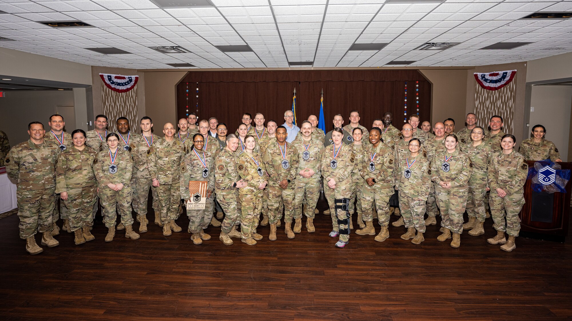 A group photo of new Senior Master Sergeant selects and leadership
