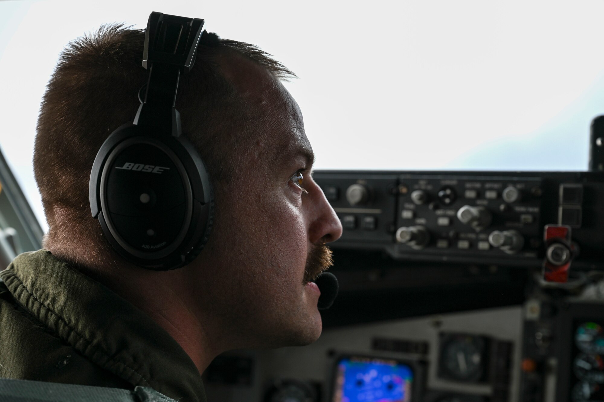 A pilot speaks to his copilot.