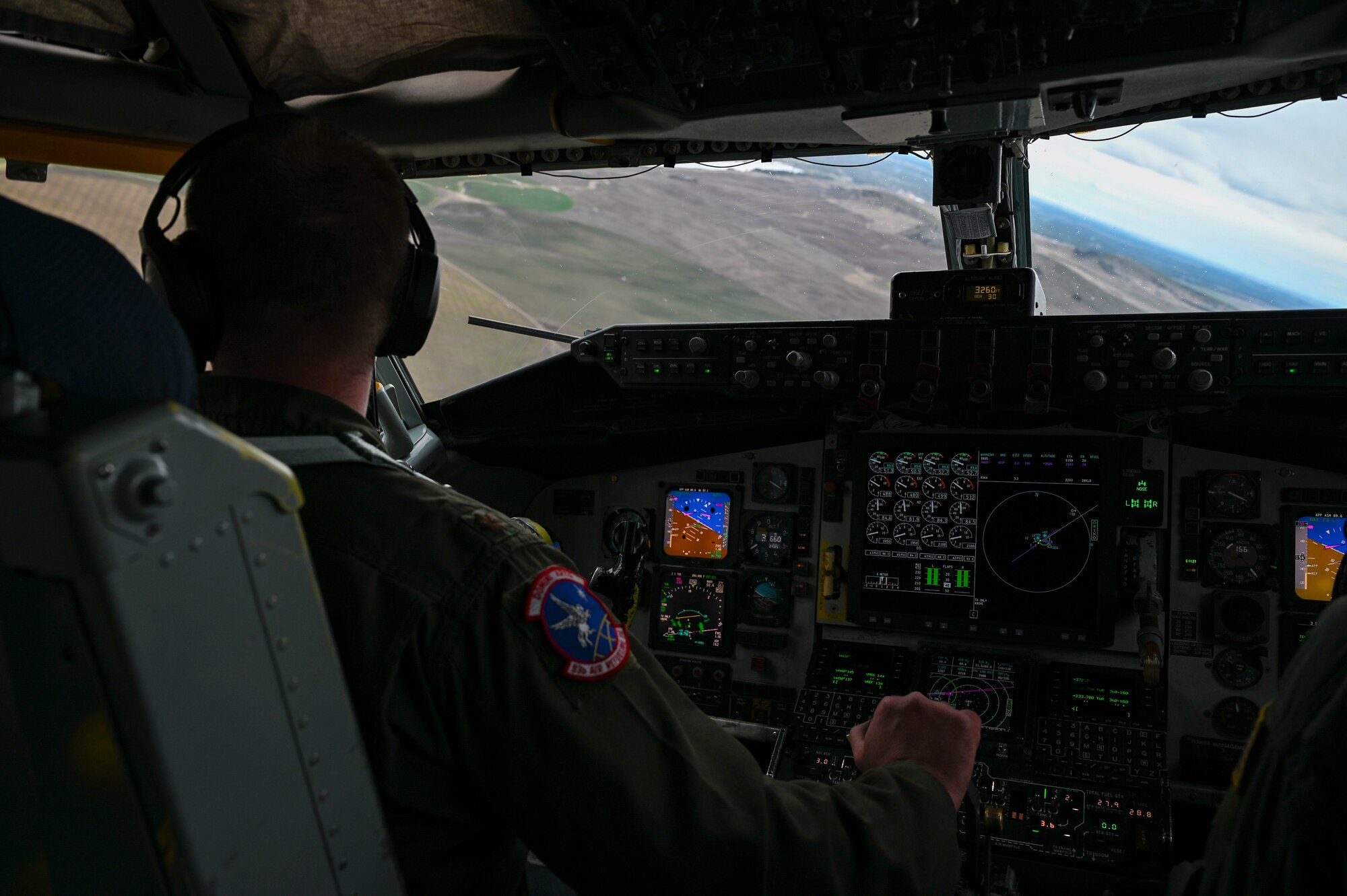 A pilot flies a plane.