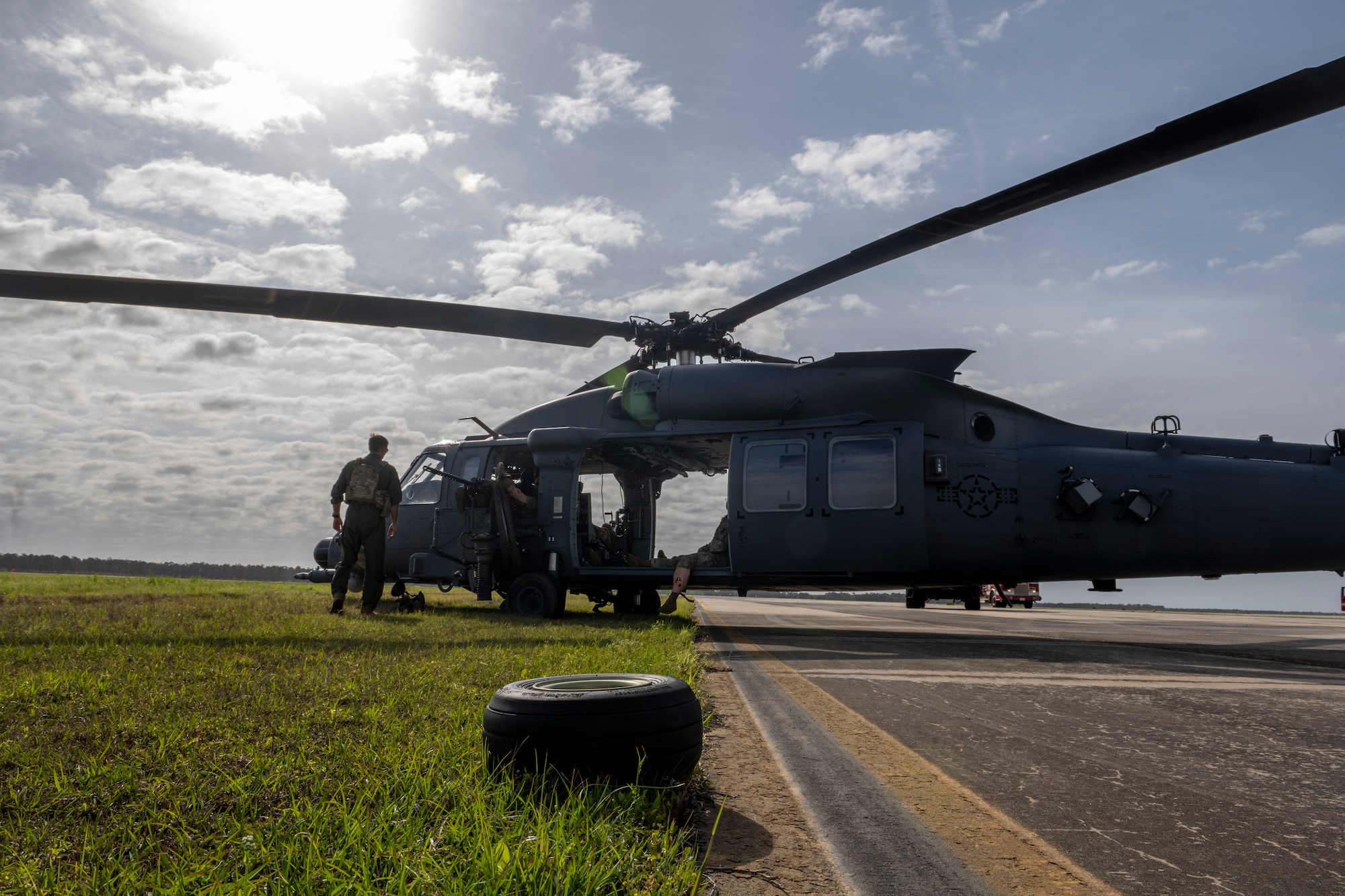 U.S. Air Force Airmen assigned to the 41st Rescue Squadron conduct a simulated aircraft accident response exercise at Moody Air Force Base, Georgia, March 26, 2024. This home-station exercise simulated a hard landing of an HH-60W Jolly Green II with injured aircrew members designed to test the communication and response of Moody Airmen. (U.S. Air Force photo by Senior Airman Deanna Muir)