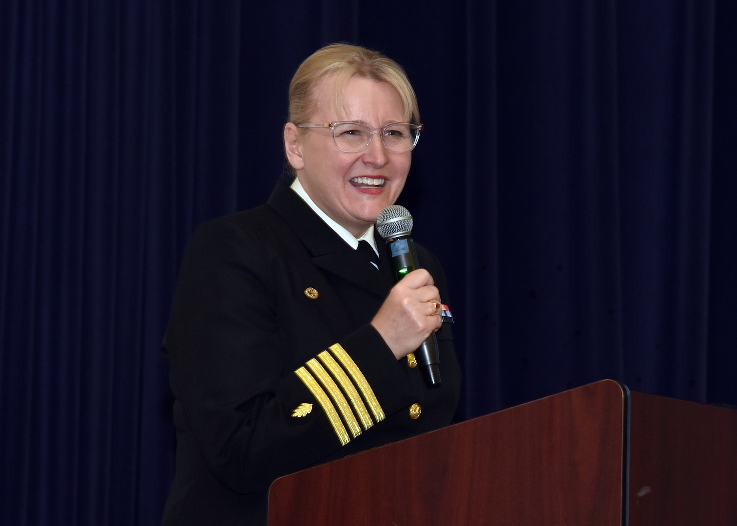 JOINT BASE SAN ANTONIO-FORT SAM HOUSTON – (March 27, 2024) – Capt. Jennifer Buechel, of Woodhaven, Mich., commanding officer, Naval Medical Research Unit (NAMRU) San Antonio, served as the keynote speaker for the U.S. Citizenship Naturalization Oath Ceremony held at the Military and Family Readiness Center.  Fifteen service members from the U.S. Army, Navy, and Air Force became U.S. citizens from the countries of China, Kenya, Jamaica, Nigeria, Vietnam, Venezuela, and The Philippines.  The Oath of Allegiance was administered by Immigration Service Officer Yoli Fleming.  NAMRU San Antonio’s mission is to conduct gap driven combat casualty care, craniofacial, and directed energy research to improve survival, operational readiness, and safety of Department of Defense (DoD) personnel engaged in routine and expeditionary operations.  It is one of the leading research and development laboratories for the U.S. Navy under the DoD and is one of eight subordinate research commands in the global network of laboratories operating under the Naval Medical Research Command in Silver Spring, Md. (U.S. Navy photo by Burrell Parmer, NAMRU San Antonio Public Affairs/Released)