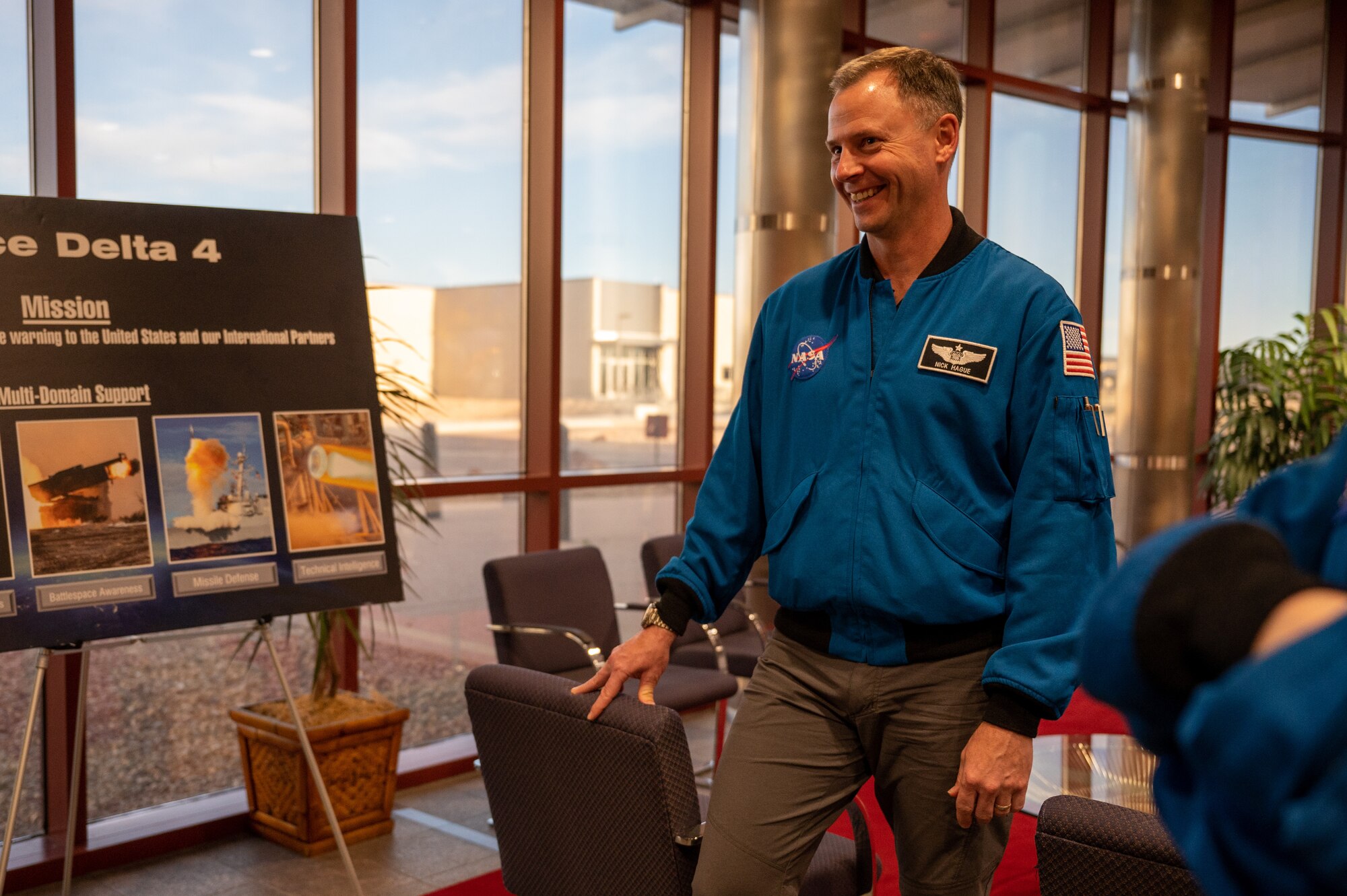Officer briefs Astronauts