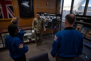 Officer briefs Astronauts