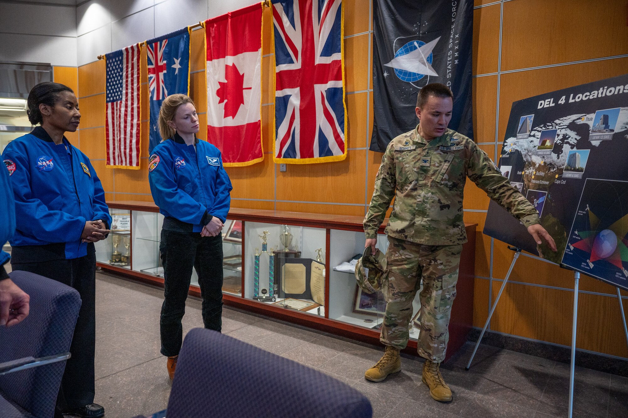 Officer briefs Astronauts